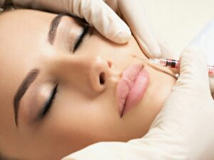 Woman receiving a Botox injection at Nixa Dental, showcasing expert facial aesthetic care in Nixa, MO.